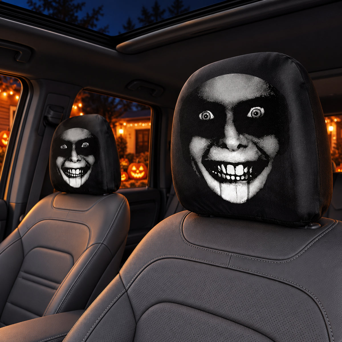 Wide Grin horror face headrest covers in a car interior