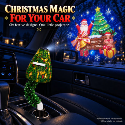 Green Christmas tree USB projector connected to a car USB adapter, with a Christmas greeting projection shown on glass as an illustration.