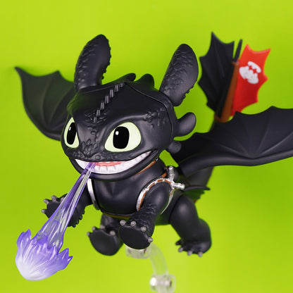 CARMOJ Articulated Toothless car ornament posed with a purple flame effect
