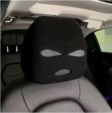 CARMOJ Black car seat headrest cover installed on a car seat