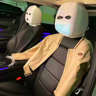 CARMOJ Black and white car seat headrest covers installed on front seats