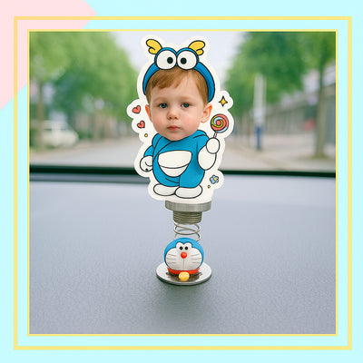 CARMOJ Custom child photo car bobblehead installed on a dashboard