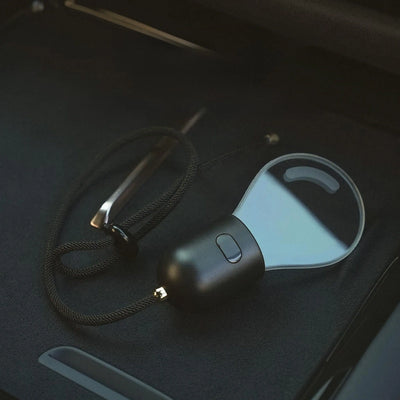 CARMOJ Glowing light bulb car charm with hanging cord and power button