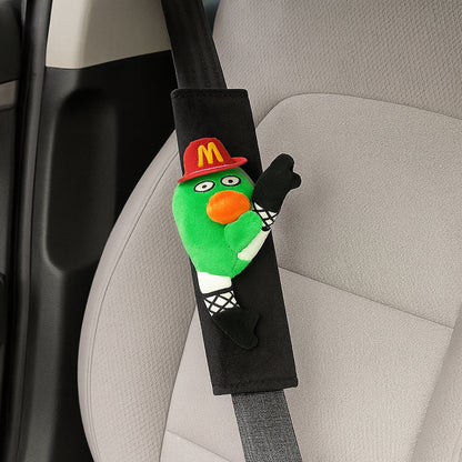 CARMOJ Green plush seat belt shoulder pad installed inside a car
