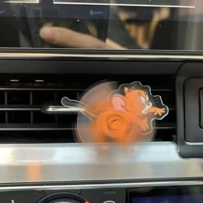 CARMOJ Jerry spinning AC vent decoration rotating on a car air vent