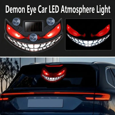 CARMOJ Solar-powered Demon Eye LED car light showing red eyes and white teeth
