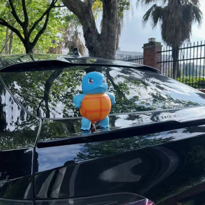 CARMOJ Squirtle water-spray car ornament installed on a car roof