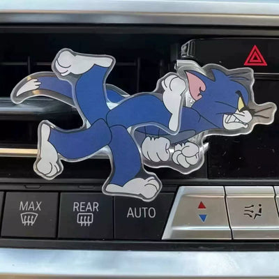 CARMOJ Tom spinning AC vent decoration installed on a car air vent